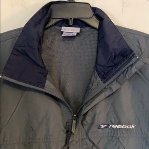 REEBOK gray/navy windbreaker jacket size XL.